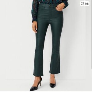 Coated high rise boot crop jeans in hunter green. 
Dark Green Flared Pants